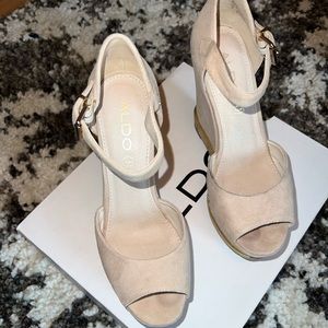 Woman’s ALDO heel wedges.